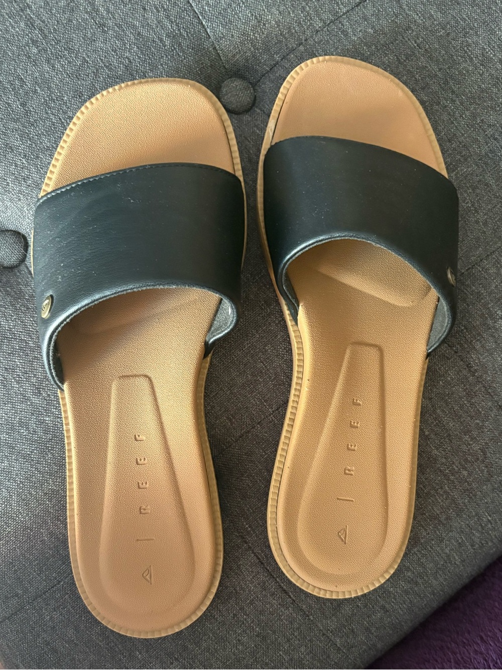 Reef Women’s Black and Tan Slide Sandals
